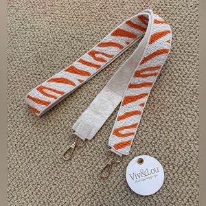 orange and white tiger stripe beaded crossbody strap - viv&lou!